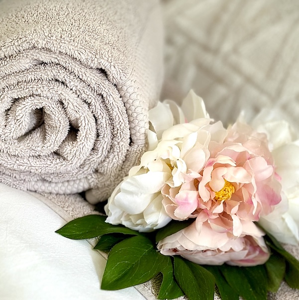 Rolled towels and flowers